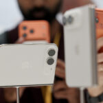 Two white/silver iPhone Duos sitting side by side.