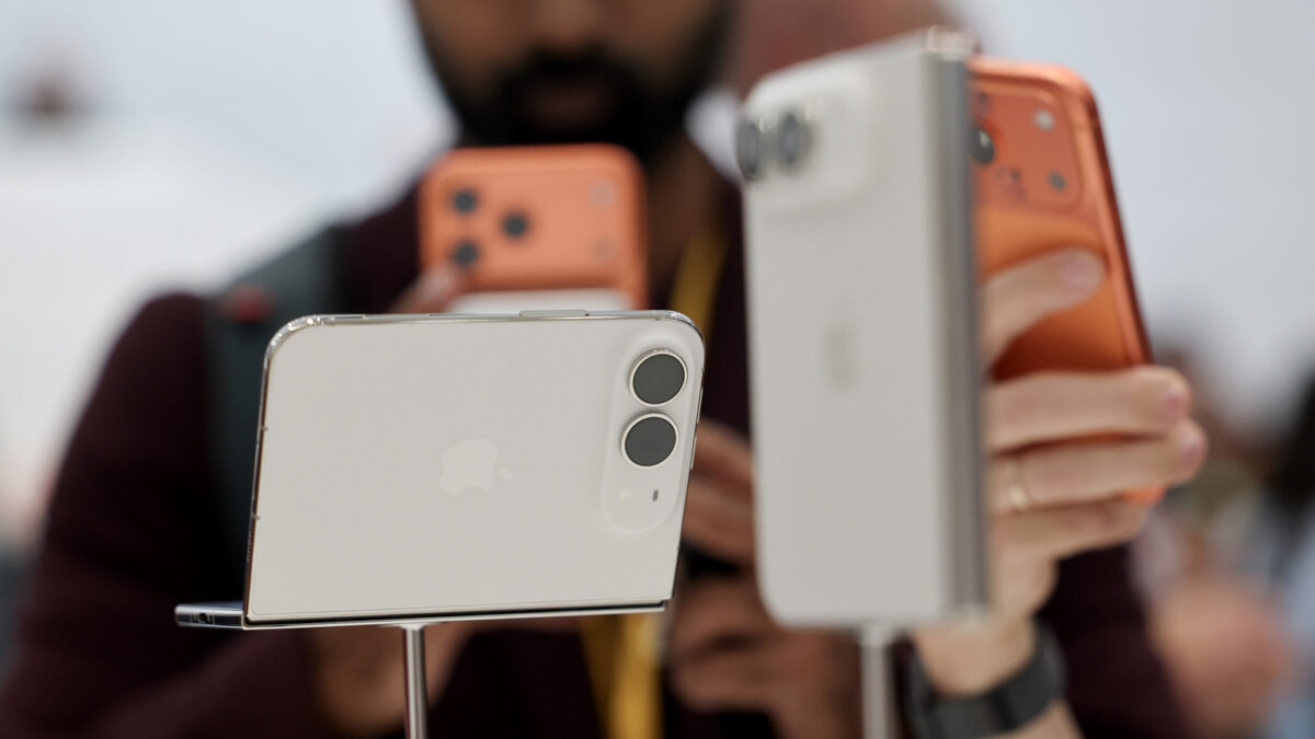 Two white/silver iPhone Duos sitting side by side.